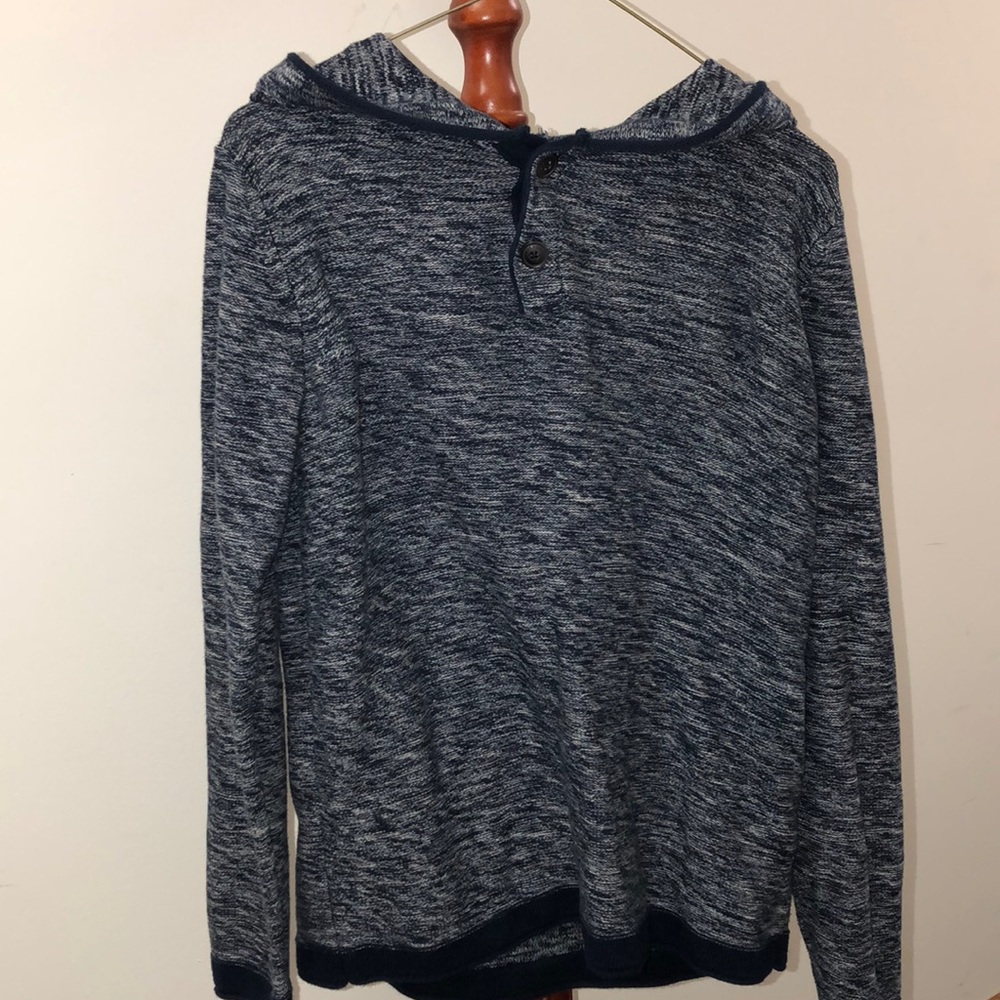 Blue and white sweater with x2 buttons and hood